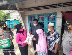 Kapolres Langkat Bantu Warga Kurang Mampu Terdampak Banjir di Batang Serangan