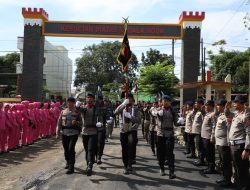 Pasukan Brimob Longmarch Pataka Perpindahan Mako Sat Brimob yang baru ke “Ksatrian Karel Edward Lumy”