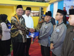 Plt Bupati Langkat Syah Afandin Sumbangkan 100 Al Quran untuk Para Hafizh
