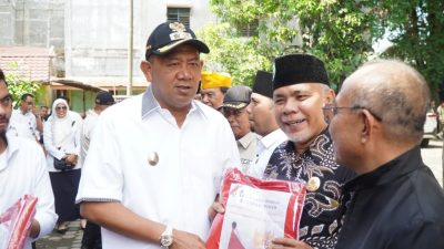 Jelang HUT Kemerdekaan RI, Plt Bupati Langkat Ikut Bagikan 10 Juta Bendera Merah Putih